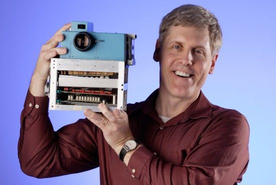 Figure 3:  Steve Sasson, with 1st digital camera, photo by Steve Kelly